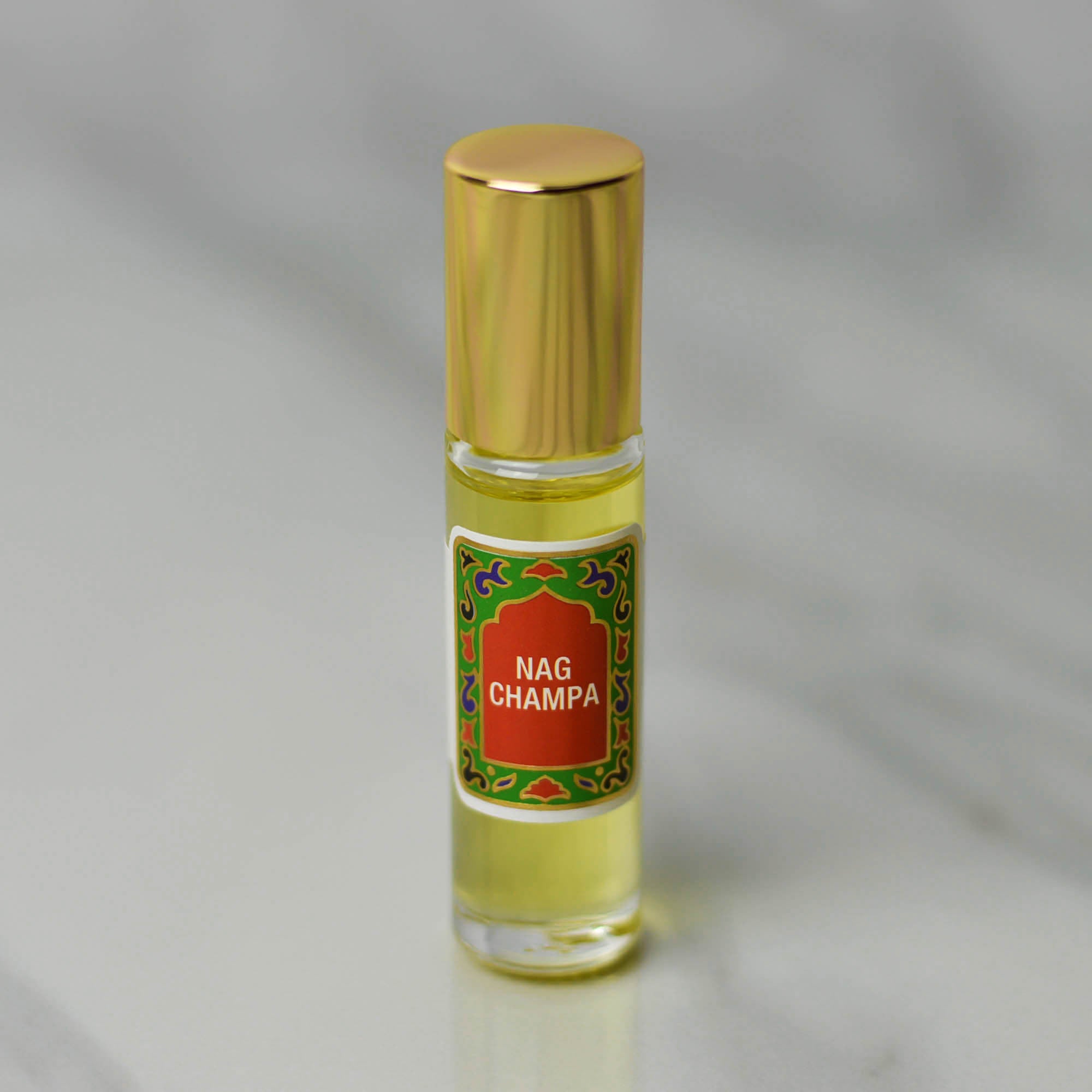 NAG CHAMPA Natural Perfume Roll on With Patchouli, Sandalwood, Champaca  Essential Oils, All Natural, Alcohol Free .33 Oz. 